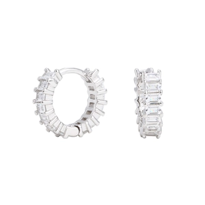 Detail view of s925 silver huggie earrings featuring clear baguette cut zircon stones