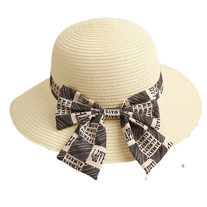 Elegant beige straw sun hat for women featuring a stylish bow with HAPPY ALWAYS print