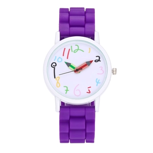 Detail of white watch dial with colorful numbers and pencil-shaped hands on purple strap