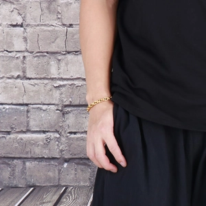 Golden link bracelet for men featuring a classic hip-hop style design on male wrist