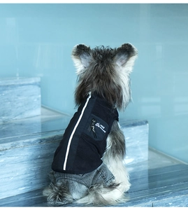 Close-up of reflective safety strip and Wild Nature logo on warm pet vest set