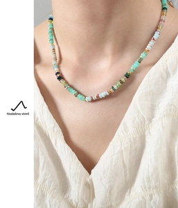 Detail of colorful beads and gold stainless steel spacers on the handmade necklace