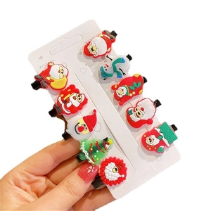 10-piece Christmas hair clip set with Santa, snowmen, and reindeer on display cards