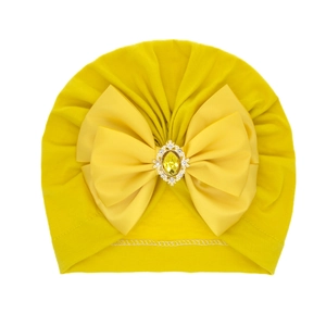 Bright yellow baby turban hat with a large bow and rhinestone gemstone decoration