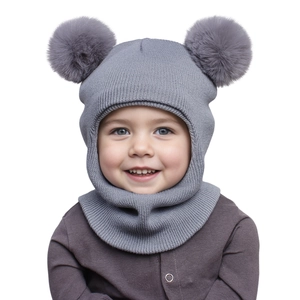 Close-up of grey baby knit hat with double faux fur pom-poms and integrated neck warmer