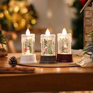 Three LED Christmas water lanterns with Santa and snowman scenes and glitter effect