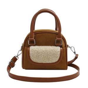 Brown suede tote bag with plush sherpa pocket and adjustable shoulder strap