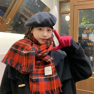 Close-up of red plaid scarf with SEZF SERVICE label, beret and gloves set