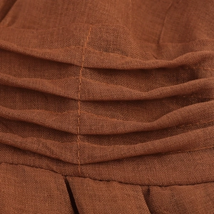 Brown pleated commuter maxi dress made of breathable cotton linen with fine texture