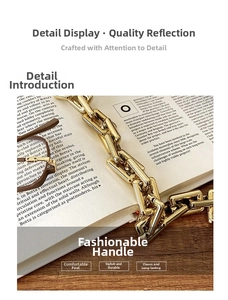 Close-up of golden metal chain strap with polished rectangular links on a magazine