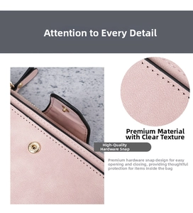 Detail of pink faux leather wallet featuring fine stitching and light gold hardware snap