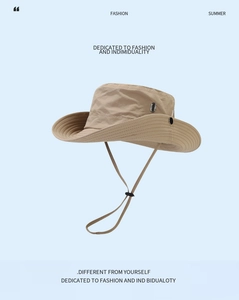 Macro detail of khaki hiking hat featuring metal ventilation eyelets and adjustable chin strap