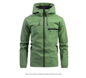 Detail of olive green outdoor hooded jacket with functional zippers and elastic cuffs