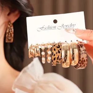 Vintage leopard print and pearl earring set with six pairs of stylish gold hoop designs
