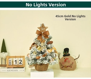 Detail of 45cm mini gold Christmas tree with snow effect, bows, and burlap base