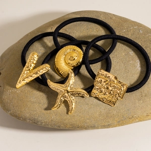 Golden stainless steel hair ties set with starfish, shell, V-shape and square charms