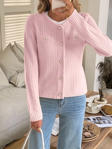 Pink knit cardigan with long sleeves, golden buttons, and two faux chest pockets for women