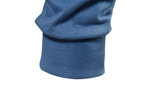 Close-up of blue ribbed knit cuffs on long-sleeve cotton shirt with detailed fabric texture