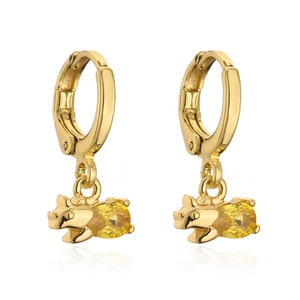 Close-up of gold pig drop earrings with oval yellow gemstone on white background