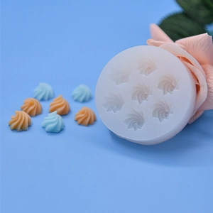 DIY geometric silicone mold for chocolate and cream sugar featuring 7 spiral holes