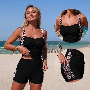 Two-piece sporty tankini swimsuit featuring leopard print panels and practical side pockets