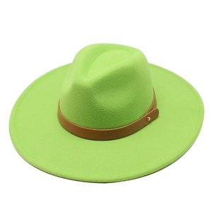 Detail of neon green wool fedora with brown faux leather band and gold stud accents