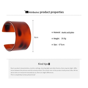 Detail view of brown tortoiseshell acetate cuff bangle with dimensions and product specifications