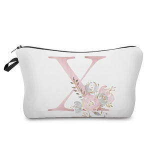 Close-up of white canvas makeup bag with pink floral letter X print