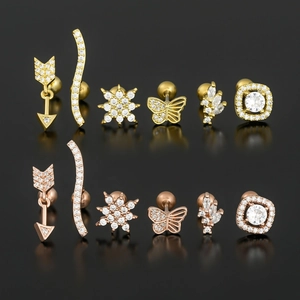 Set of 12 geometric butterfly and leaf zircon ear studs in gold and rose gold tones
