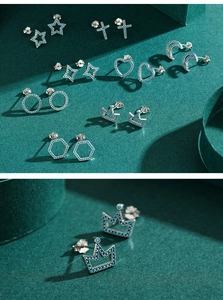 Macro detail of S925 sterling silver turquoise studs with geometric shapes and cz inlay
