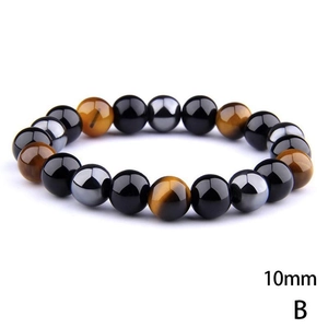 Detail of 10mm hematite, obsidian, and tiger eye stone energy bracelet for men