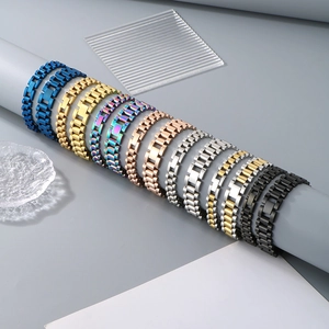 Detailed display of colorful stainless steel watch bands in multiple metallic finishes