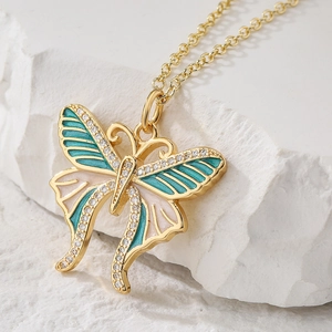 18K gold plated butterfly necklace with turquoise and pink enamel wings and crystals