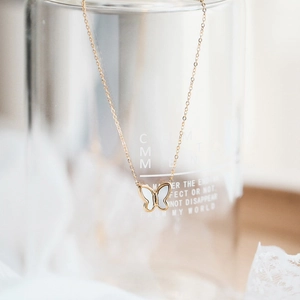 Elegant gold butterfly pendant necklace with white mother of pearl inlay for women