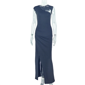 Detail of navy blue maxi dress featuring side ruching and elegant high slit design