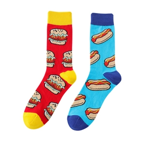 Detail of cotton crew socks featuring colorful burger and hot dog fast food patterns