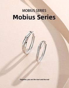 Macro shot of S925 sterling silver Mobius rings with diamonds and engraved hallmarks