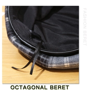 Close-up of adjustable strap detail inside the plaid tweed octagonal newsboy cap