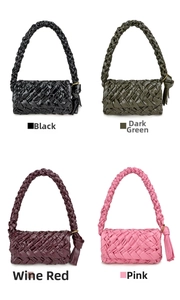Detail of woven oil wax leather crossbody bags in black green burgundy and pink