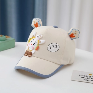 Detail of baby baseball cap featuring a cute 3D bunny and cloud ears with heart patterns