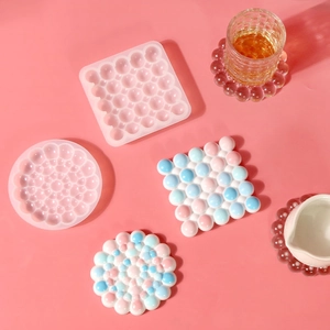Macro detail of square and round bubble texture silicone molds for DIY resin coasters