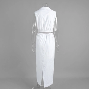 Detail view of the back split design and elastic waist on a white two-piece skirt set