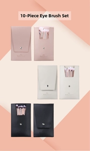Detail view of a 10pcs fiber eye makeup brush set with leather cases in pink and black