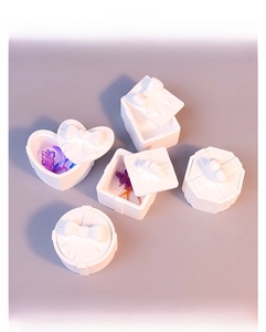 DIY silicone storage box molds featuring heart and square shapes with 3D bow tie lids