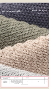 Detail showing premium long-staple cotton fabric texture and material composition data