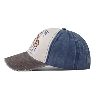 Detail of vintage three-color washed cotton baseball cap with retro motorcycle print