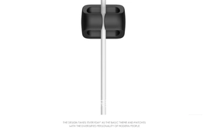 Macro detail of black silicone 5-slot cable organizer for USB wires and cord management