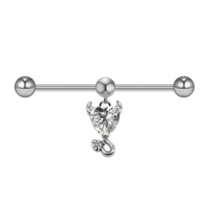 Detail of silver heart-shaped devil industrial barbell with cubic zirconia and demon horns