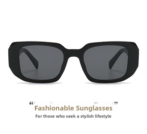 Detailed close-up of premium rectangular black sunglasses with wide frame and dark lenses