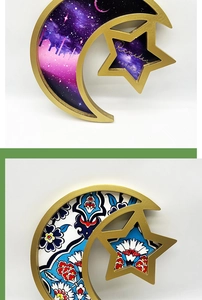 Detail of moon and star Ramadan trays with golden frames and intricate mosaic patterns